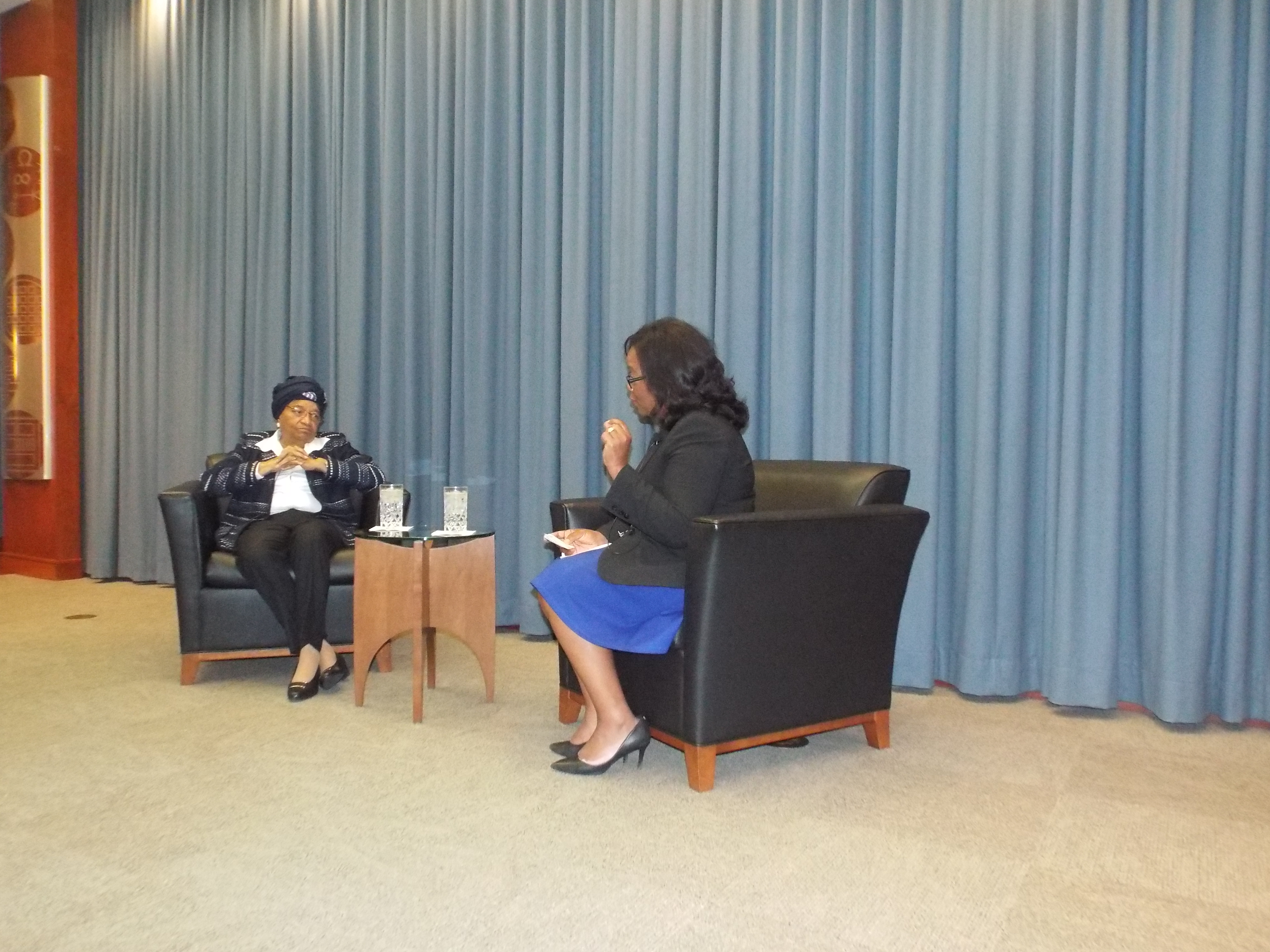 President Sirleaf seated on the platform with Moderator Cecelia Smith during the live interactive _2017 Conversation with President Ellen Johnson Sirleaf